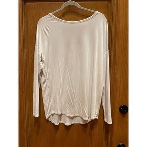 Daytrip top, size large, cream with v shaped mesh/ cutout back